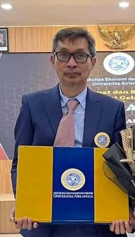 Dr. Andi Arman